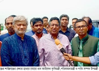 সুনামগঞ্জ শান্তিগঞ্জের দেখার হাওরে বোরো ধান কাটলেন তিন মন্ত্রী