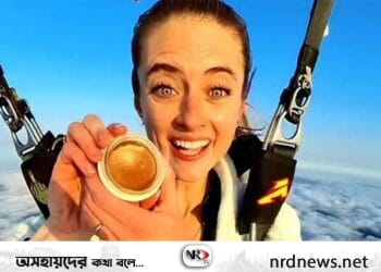 স্কাইডাইভিংয়ের সময় মেকাপ!, তরুণীর ভিডিও ভাইরাল